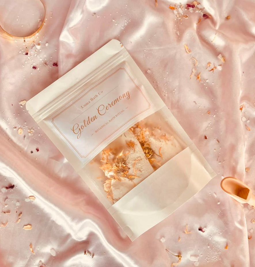 LUMA Golden Ceremony botanical bath tea pouch — warm citrus blend with chamomile, calendula and orange peel, handcrafted in Lebanon